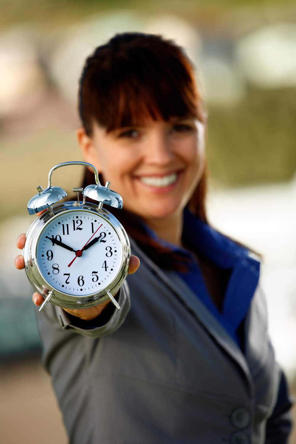 Visual of a clock, notebook, and motivational quote emphasizing easy time management hacks for everyday life.